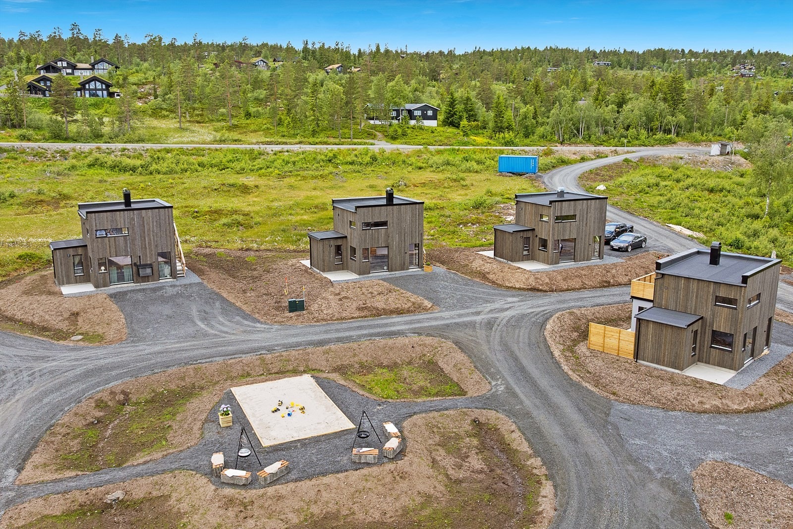 Det blir hyggelige fellesområder på hvert tun, med mange rekreasjonsmuligheter for store og små. Bilde fra en ferdigstilt tun i prosjektet. Galleribilde