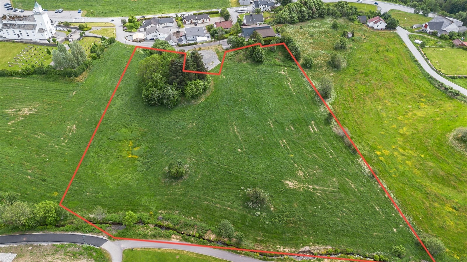 Sveio sentrum - Sentralt beliggende tomteområde - regulert for bolig/næring Galleribilde