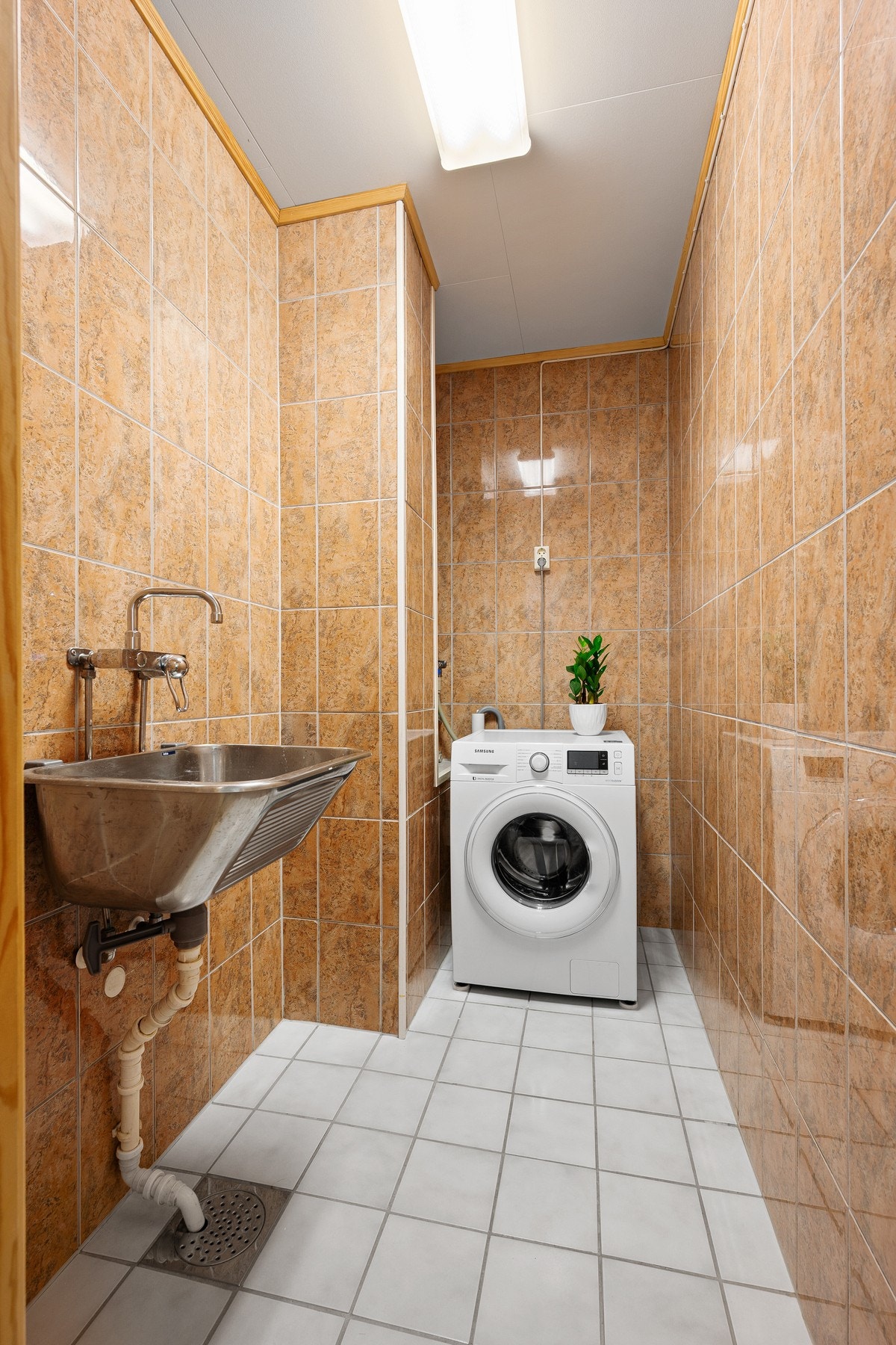 Meget praktisk med eget vaskerom Galleribilde