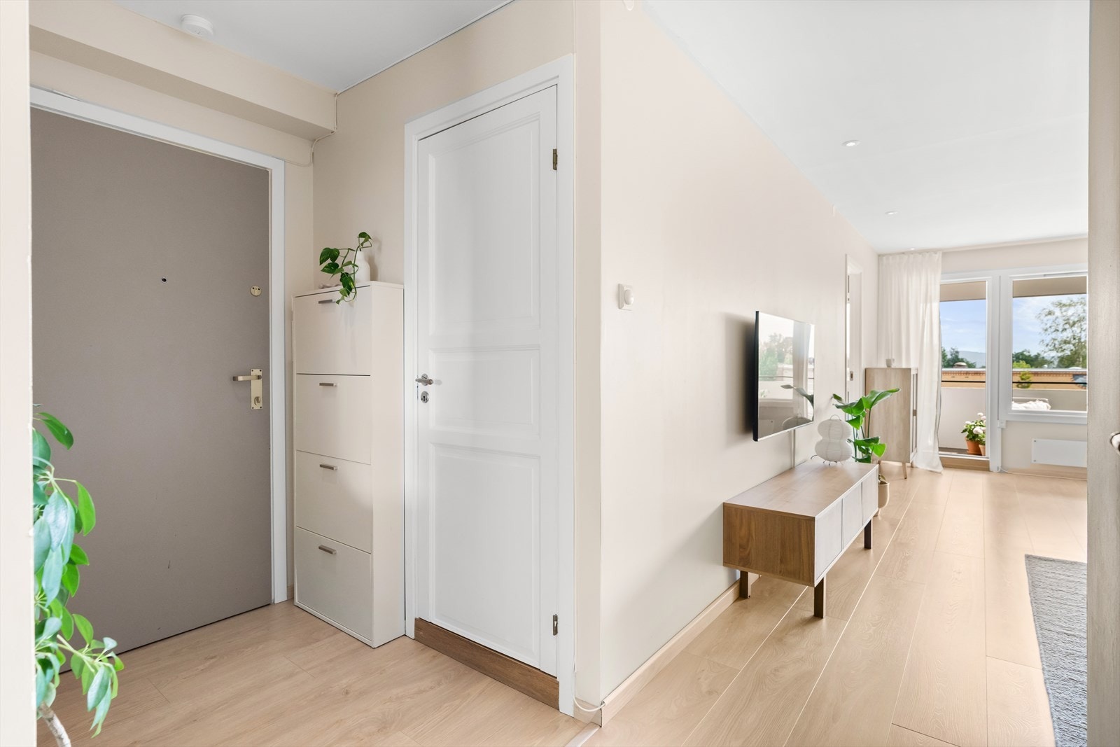 En entré som setter en hyggelig og innbydende tone for resten av hjemmet. Galleribilde