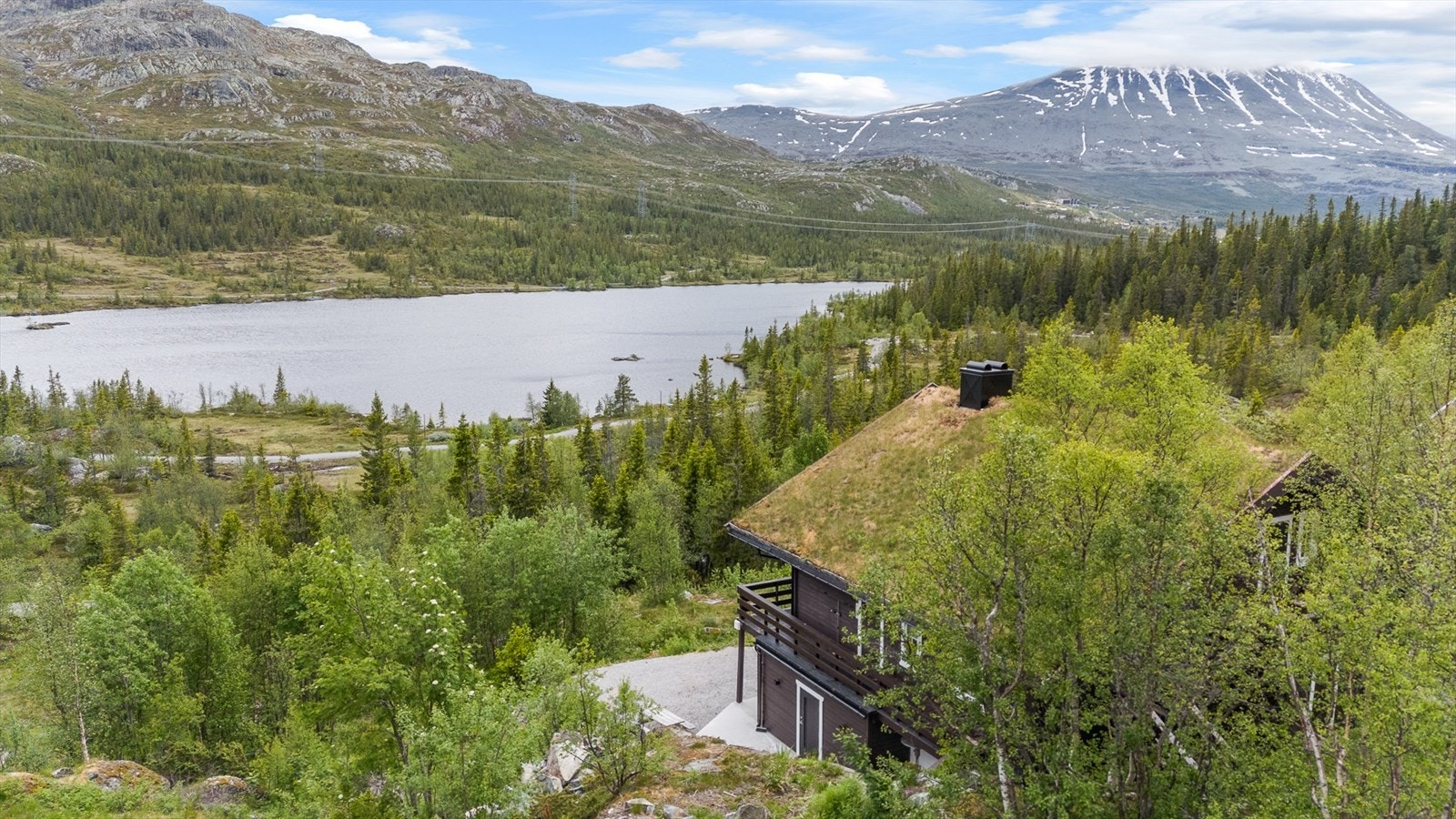 Her får du en meget innbydende fritidsleilighet med panoramautsikt over majestetisk fjellandskap Galleribilde
