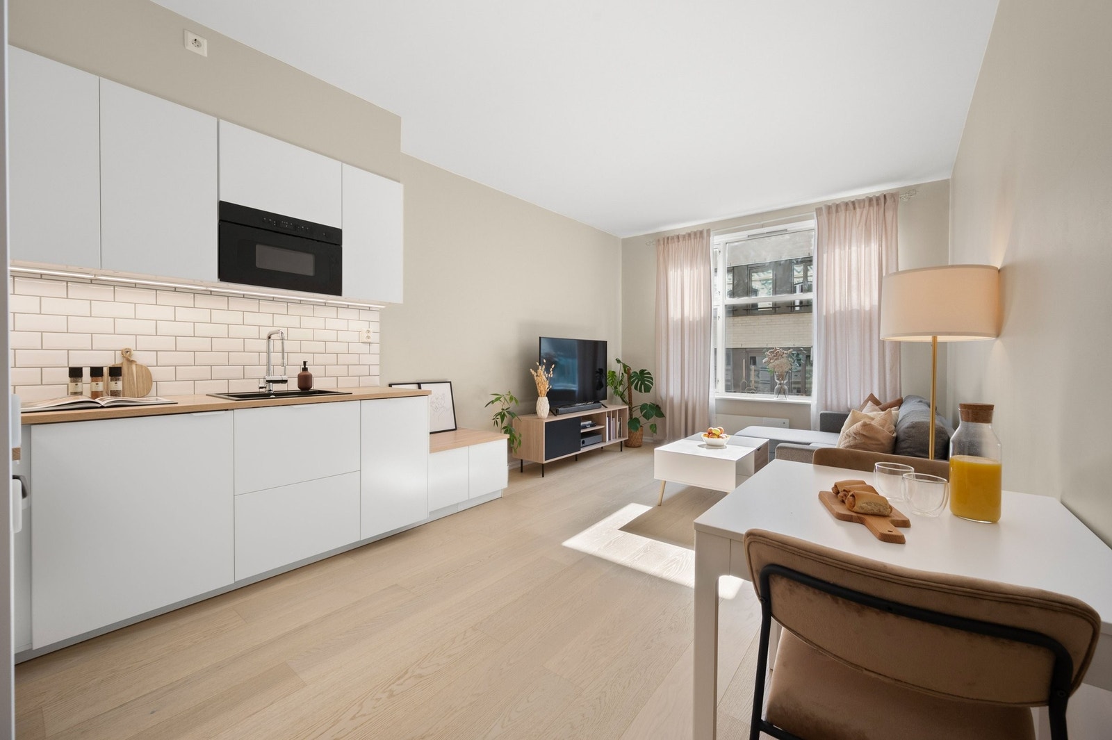 En lys og moderne 2-roms med beliggenhet i byggets 3.etasje. Galleribilde