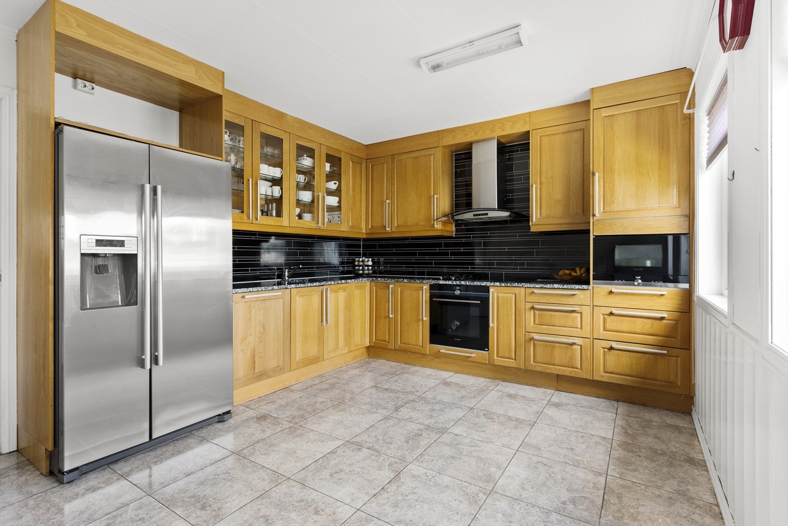 Innredningen består av en steinbenkeplate med nedfelt oppvaskkum og 1-greps blandebatteri. Galleribilde