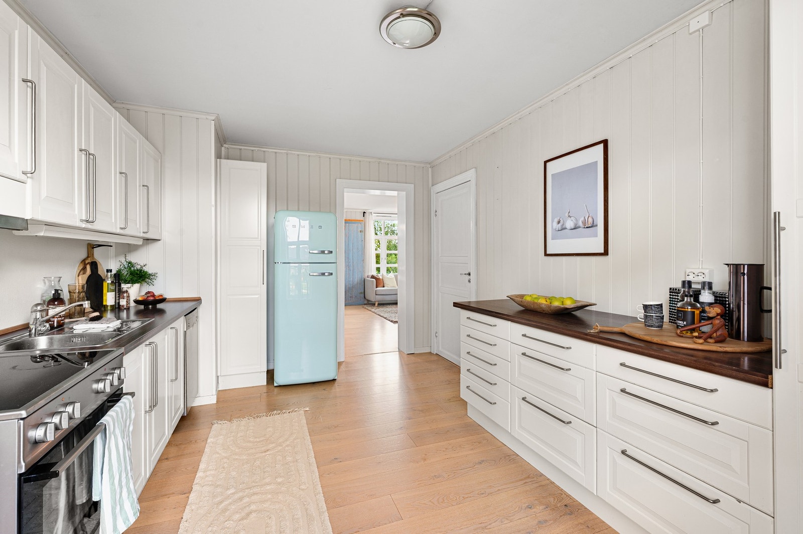 Kjøkkenet er pent og romslig, med et areal på 12,6 kvm. Galleribilde