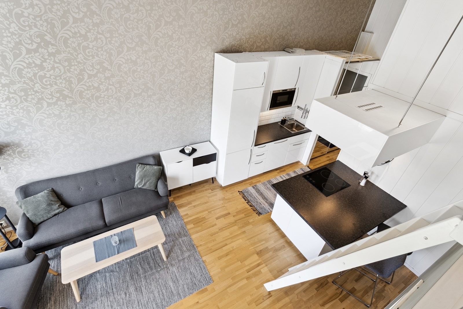 Leiligheten har en åpen og innbydende stue-/kjøkkenløsning. Galleribilde