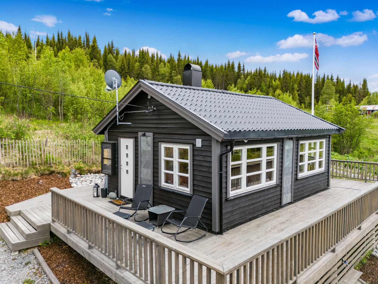 Nyt solrike dager på verandaen. Galleribilde