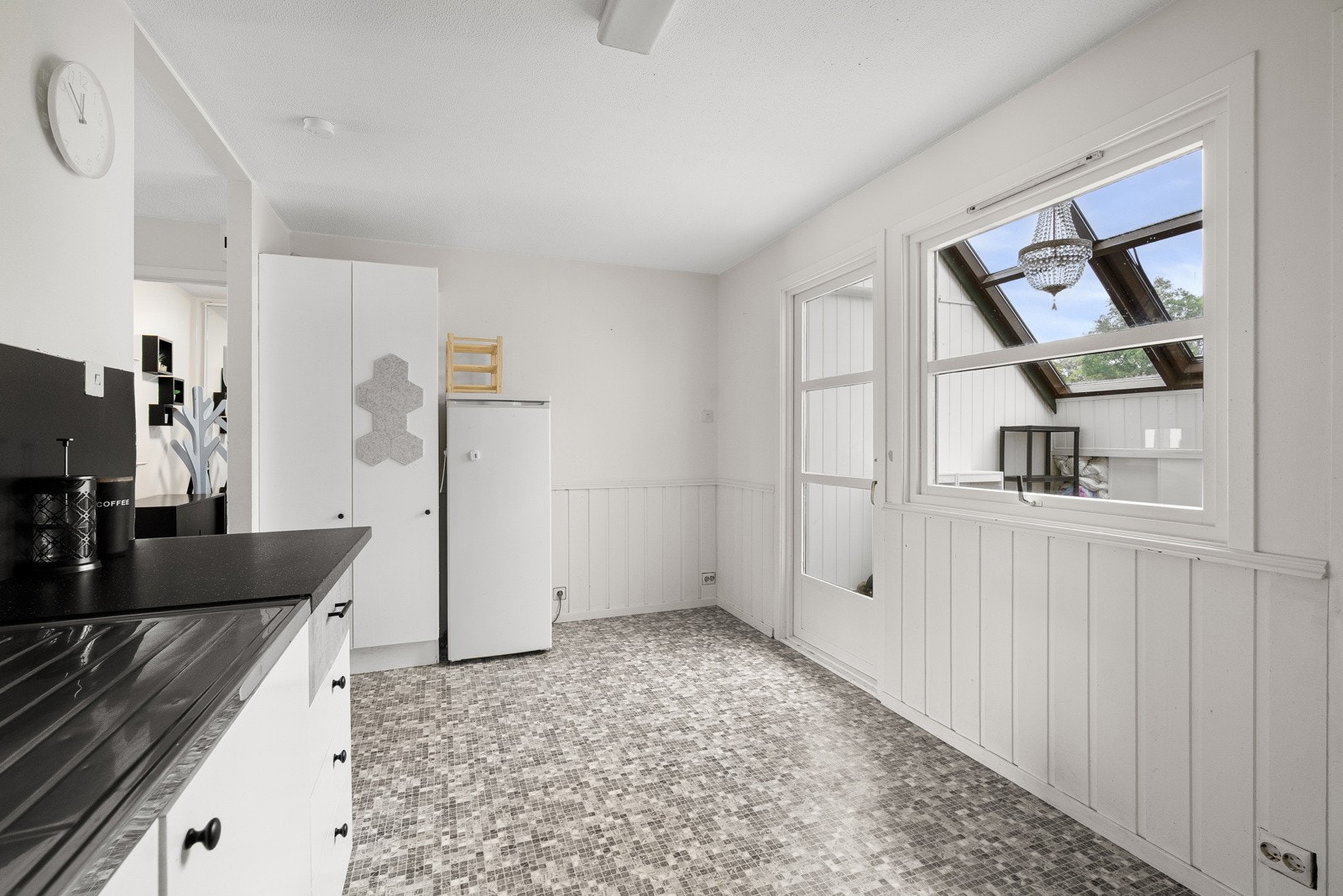 Den store plassen gjør det enkelt å innrede med en kjøkkenøy. Galleribilde