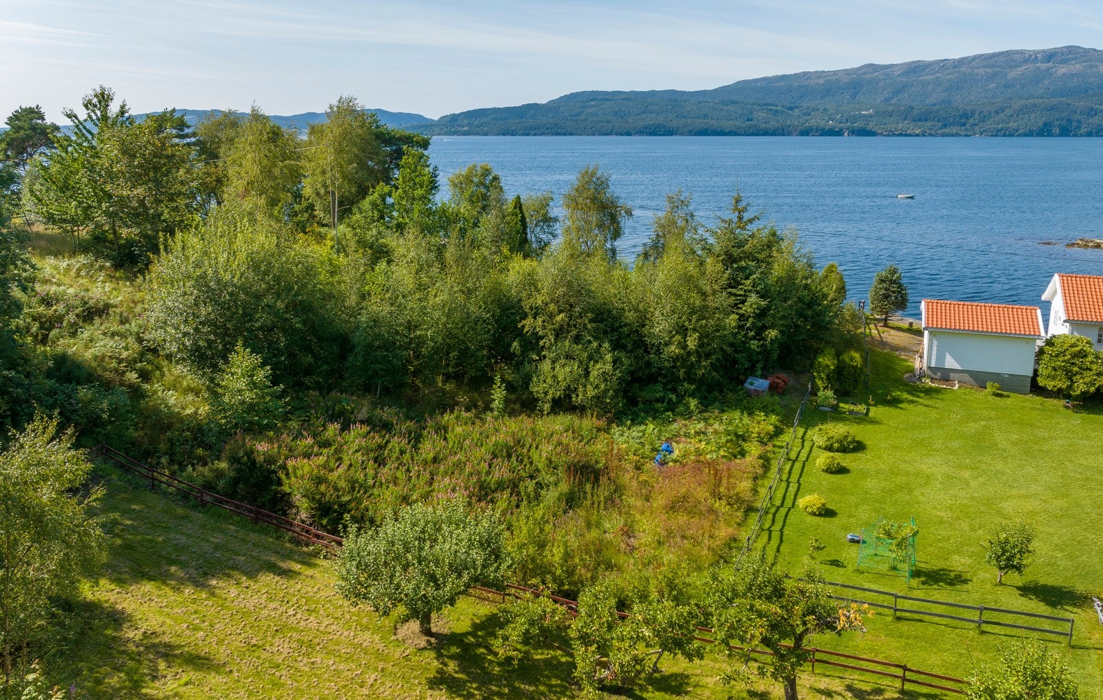Tomten er uregulert, men avsatt til boligformål i kommuneplanen Galleribilde