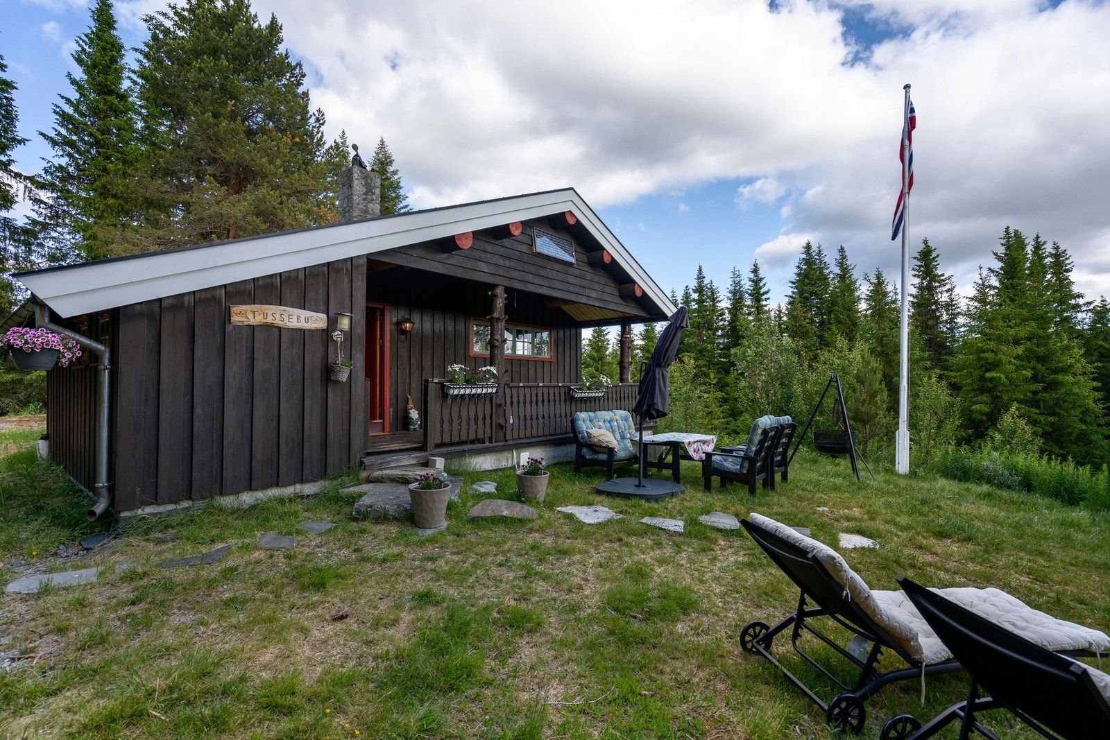 Hytten med koselige sitterplasser Galleribilde