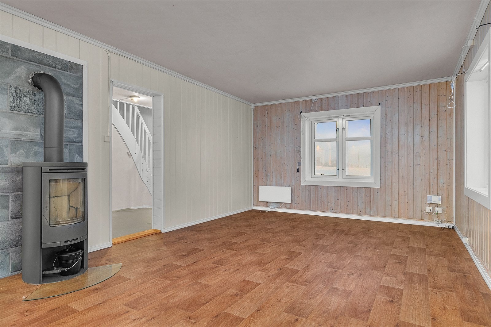 I stue er det vedovn som gir lun og god varme. Galleribilde