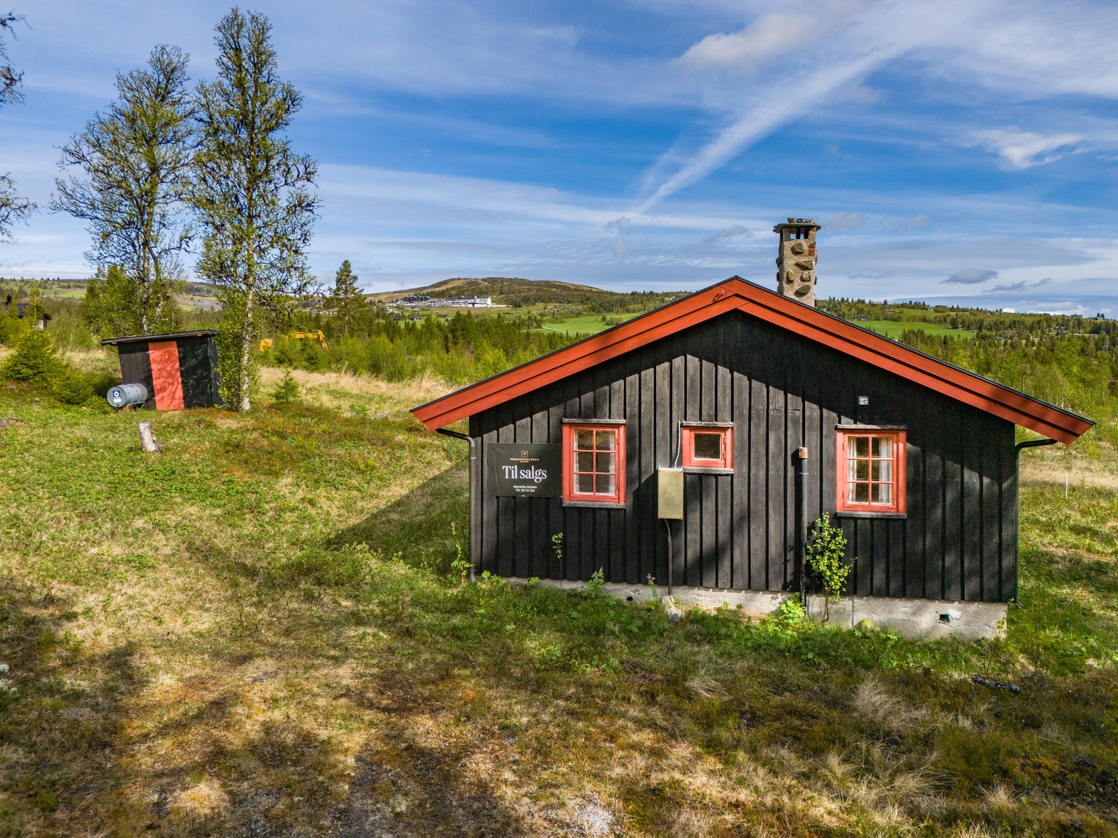 Biloppstillingsplasser ved hytta Galleribilde