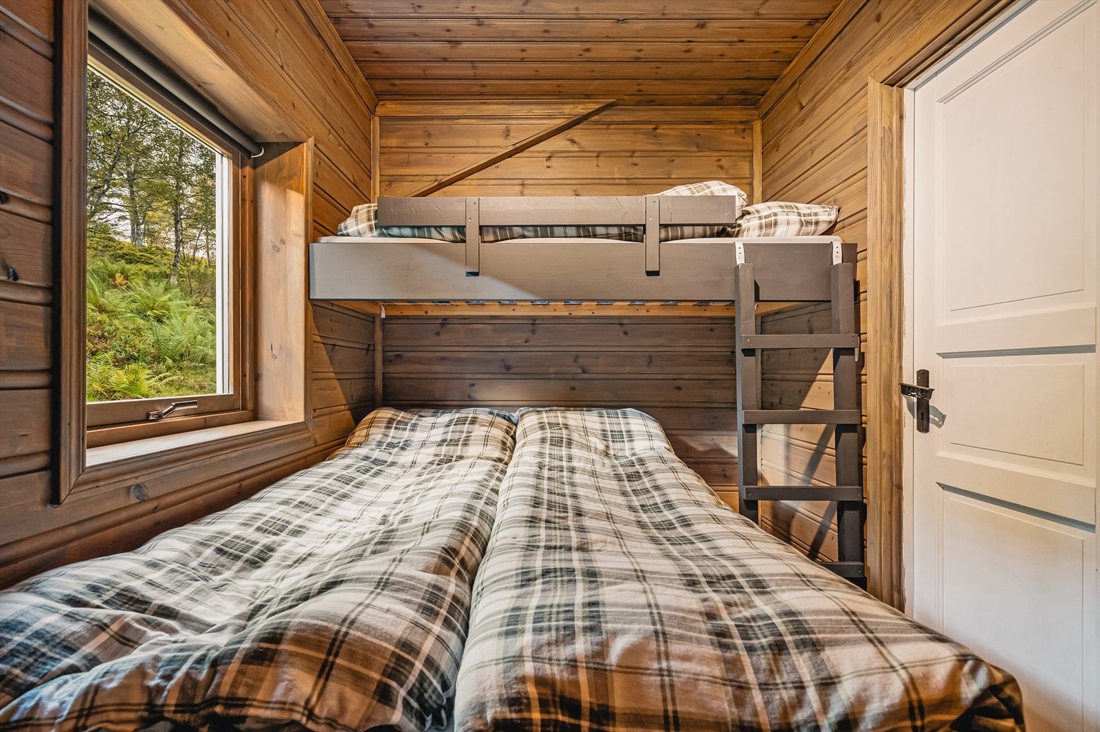 Hytten har totalt 3 soverom på 6,3 m², 4,0 m² og 4,0 m². Galleribilde