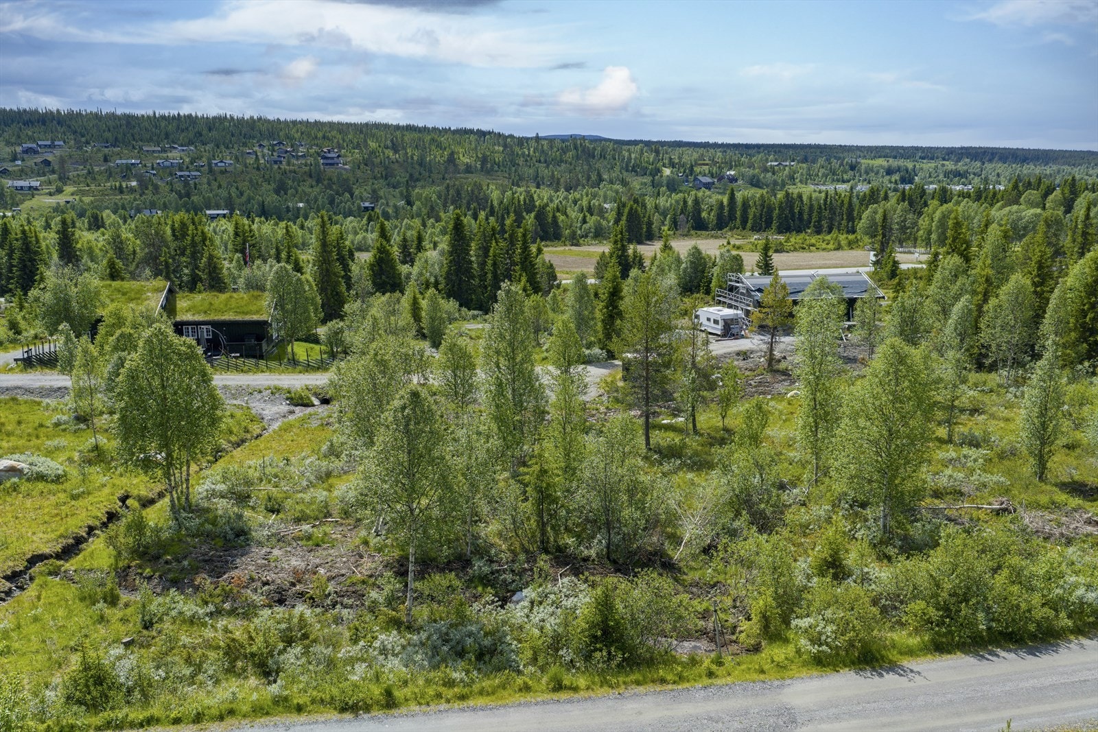 Tomtene får lagt strøm, vann og avløp lagt frem til tomtegrensene. Galleribilde