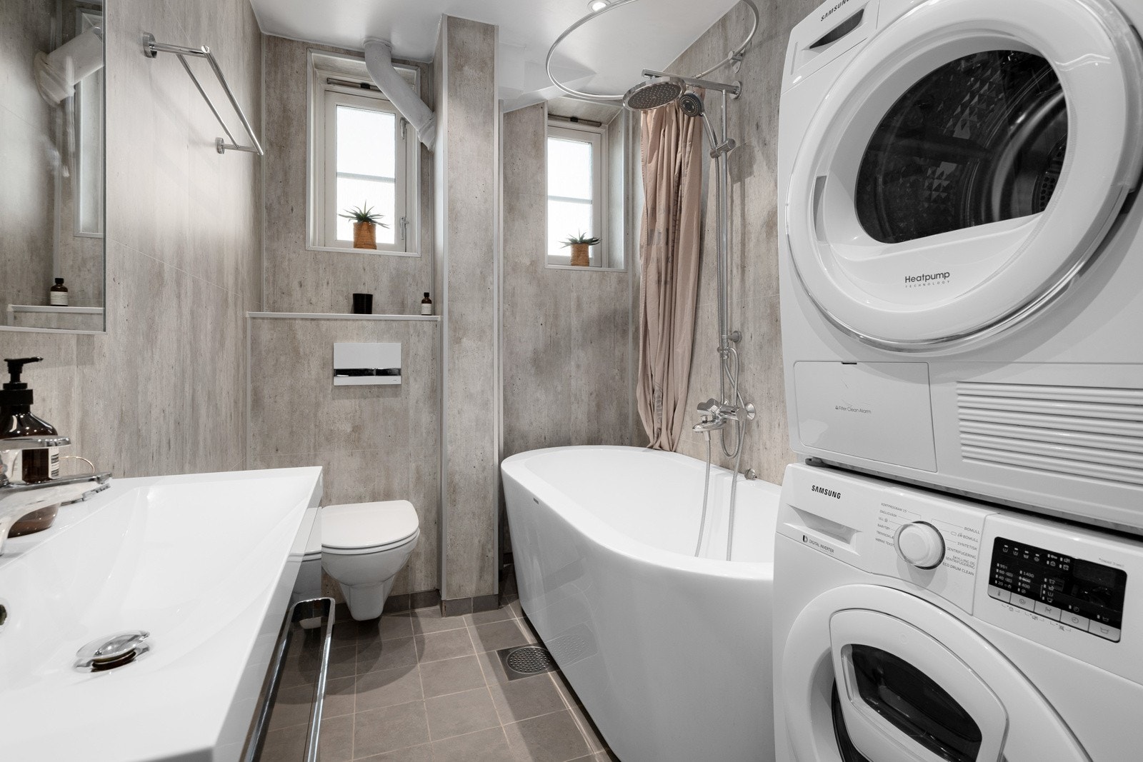 Leiligheten har et innbydende og delikat baderom. Galleribilde