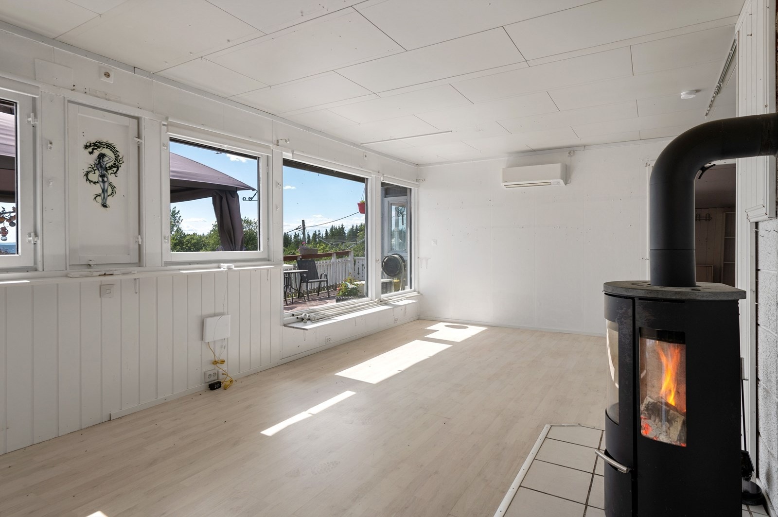 Peis som gir en lun atmosfære. Galleribilde