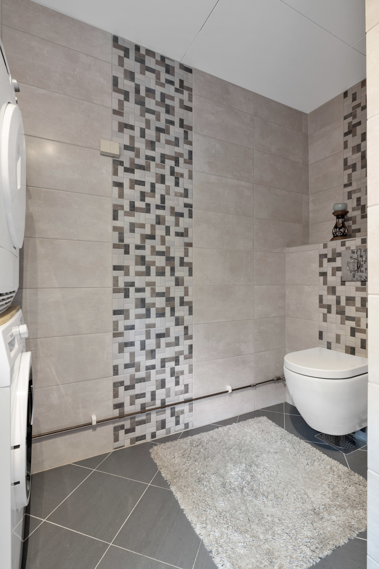 Vaskerommet har også veggfestet klosset Galleribilde