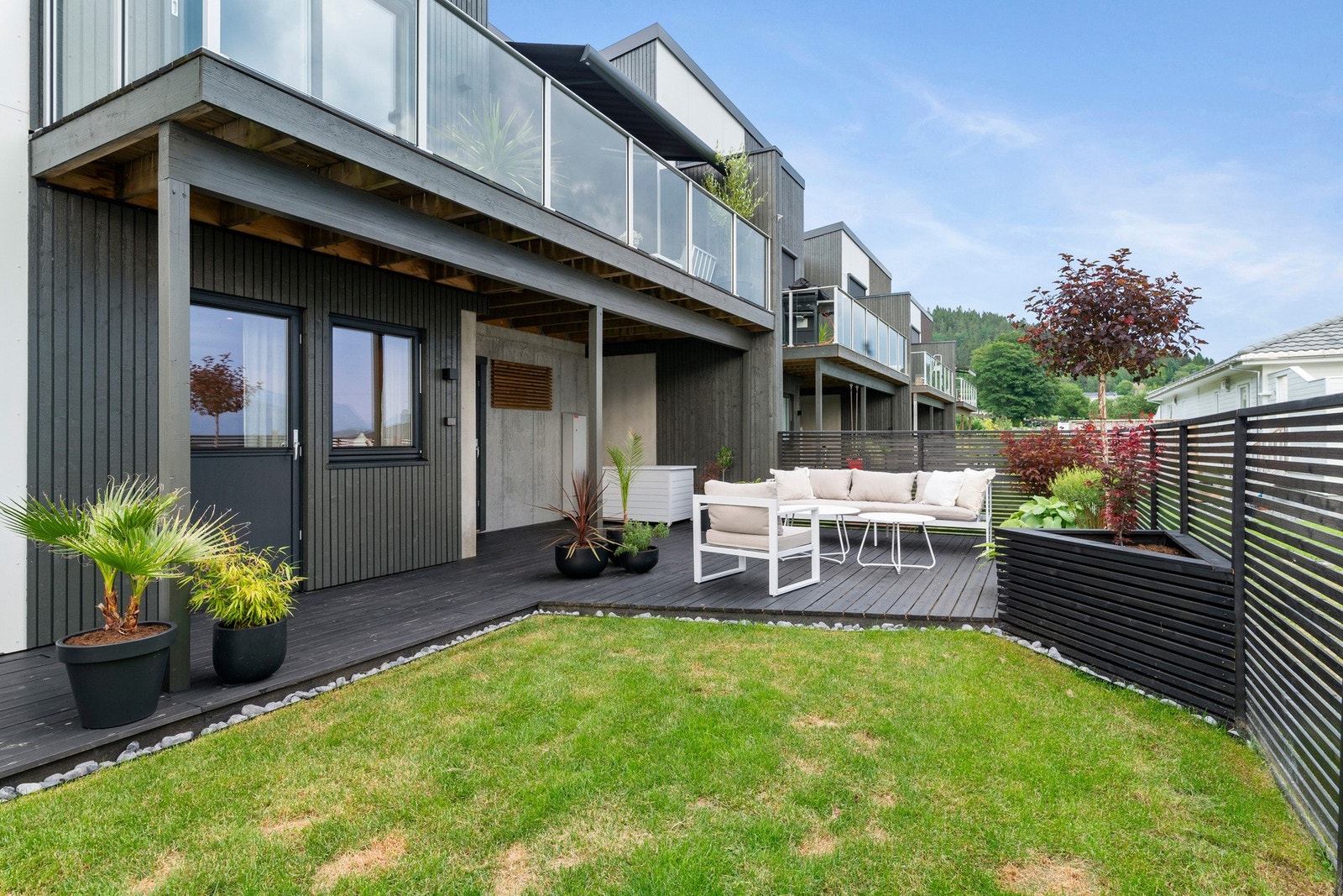 Markterrassen er lun og lekker og delvis overbygd. Galleribilde