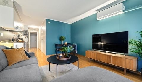 Stuen er møblert og har varmepumpe. Galleribilde