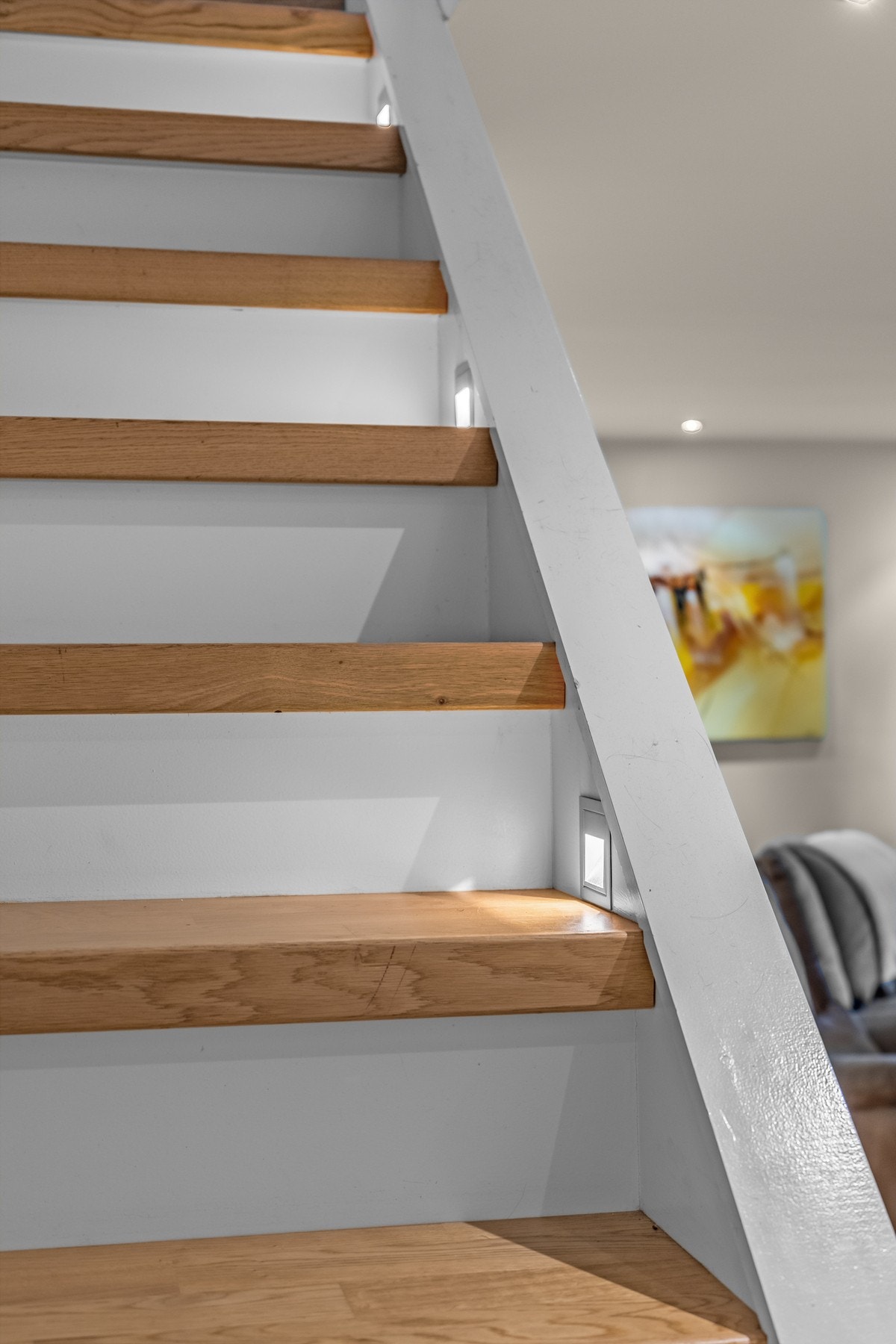 Vi tar turen opp. Fine lysdetaljer i trappen. Galleribilde