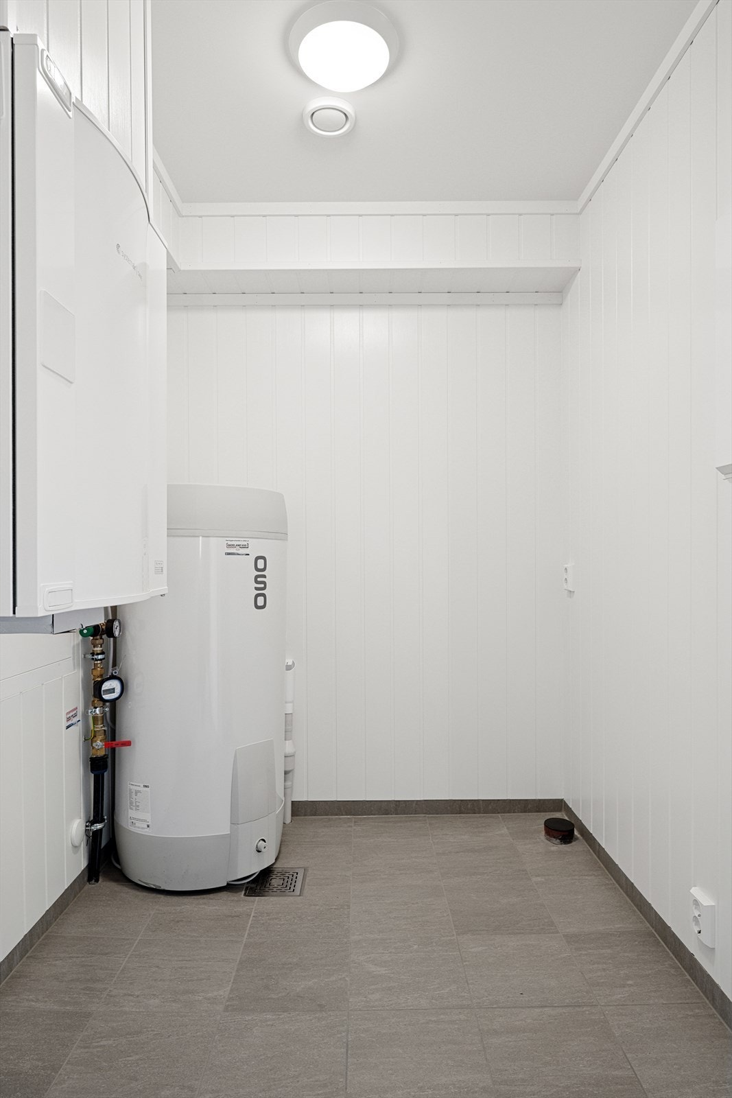 Innvendig bod med opplegg til vaskemaskin. Galleribilde