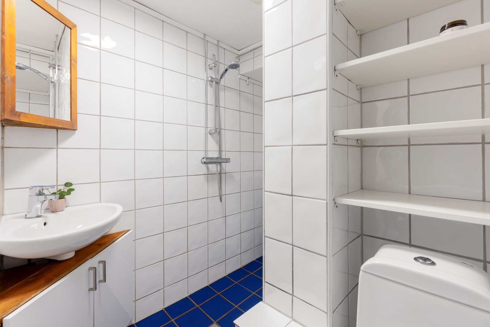 Flislagt bad med gulvvarme. Galleribilde