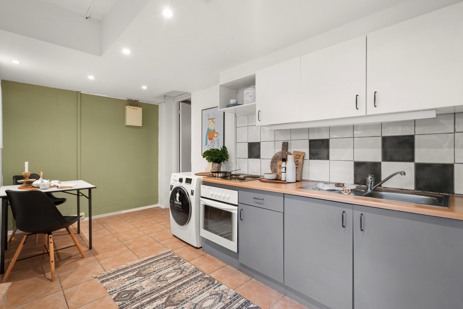 Leiligheten har et kjøkken. Galleribilde