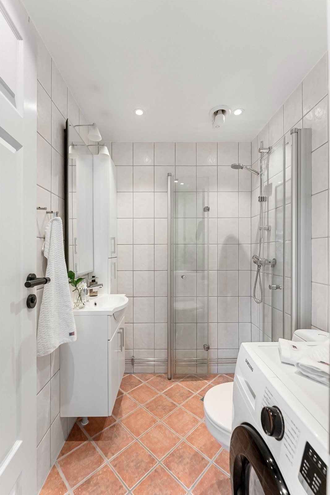 Badet har opplegg for vaskemaskin. Galleribilde