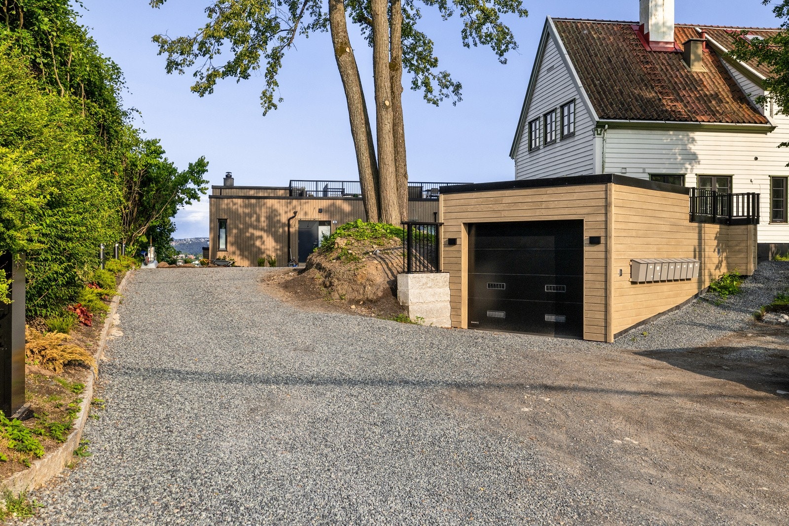 Det medfølger en biloppstillingsplass med elbillader Galleribilde