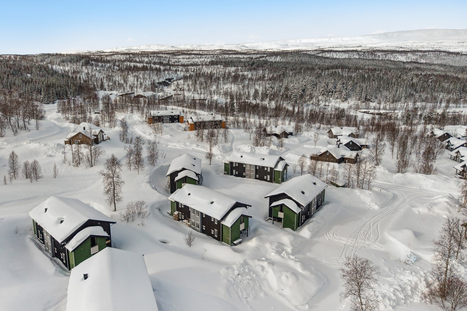 Stille og rolig nabolag bestående av fritidsbebyggelse (leiligheter og hytter) Galleribilde