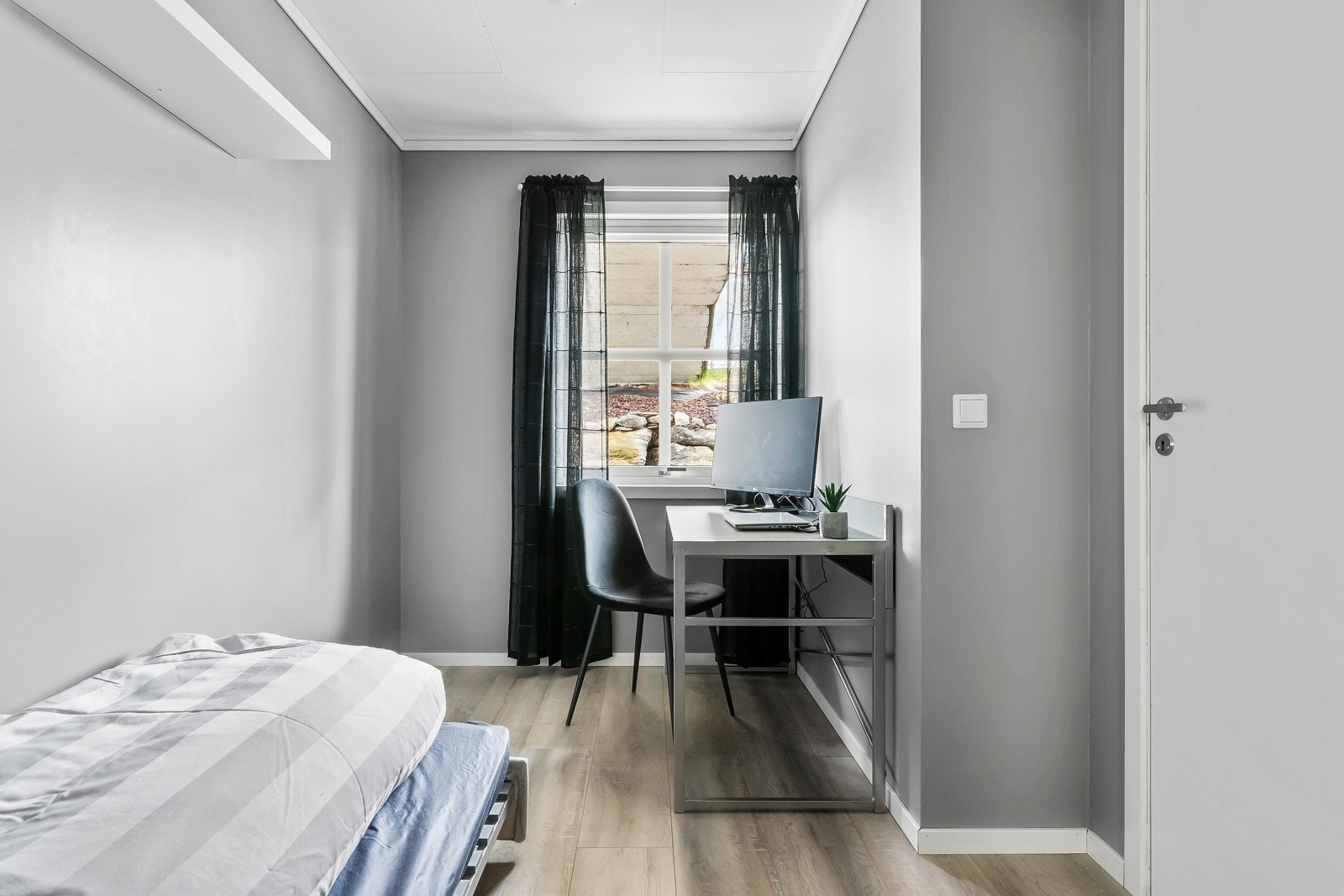 Det andre soverommet passer ypperlig som kontor, barnerom eller gjesterom. Galleribilde