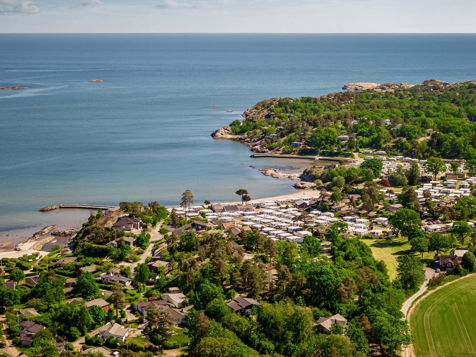 Strendene ligger som perler på en snor i området Galleribilde