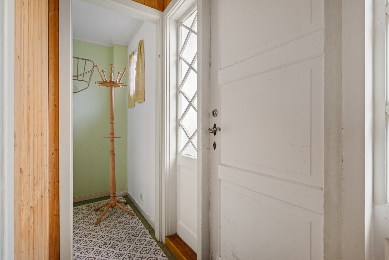 Vindfang med garderobe. På tegningen er det gjestetoalett i garderoben. Galleribilde