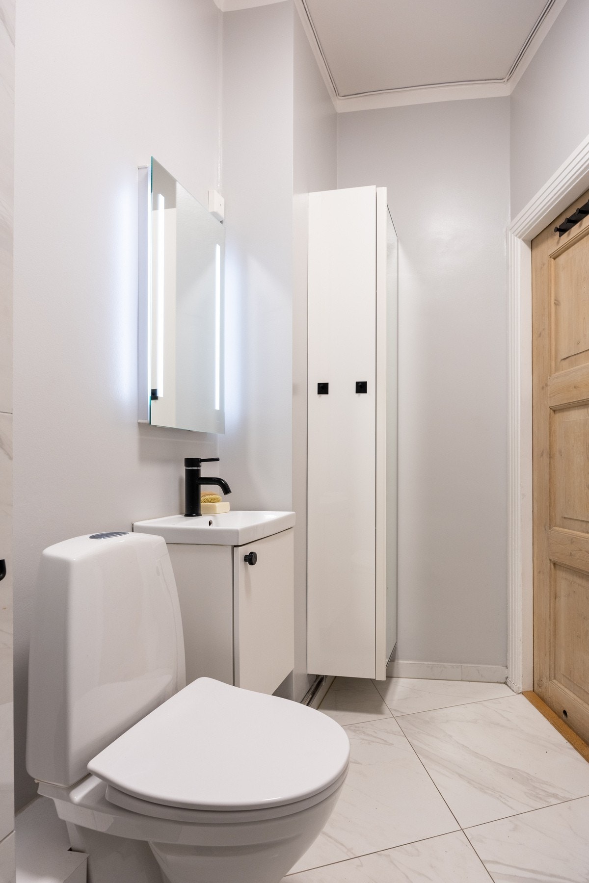 Badet har opplegg for vaskemaskin. Galleribilde