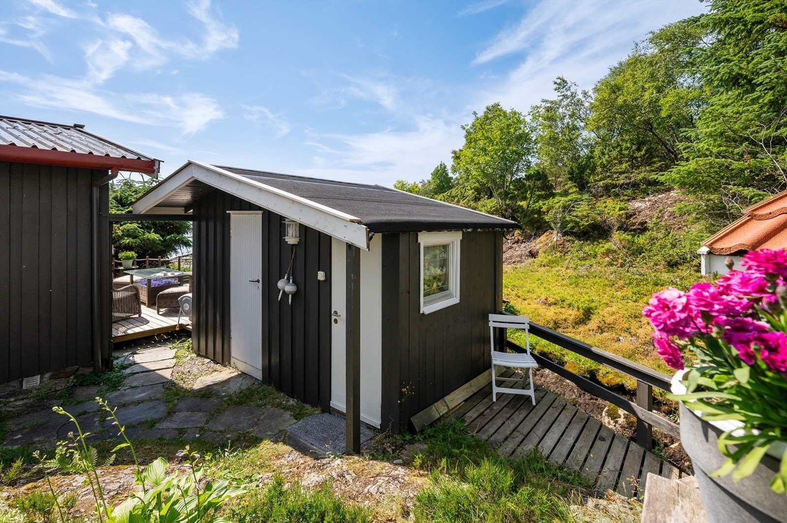 Boden ved inngangspartiet er innredet som bad. Galleribilde