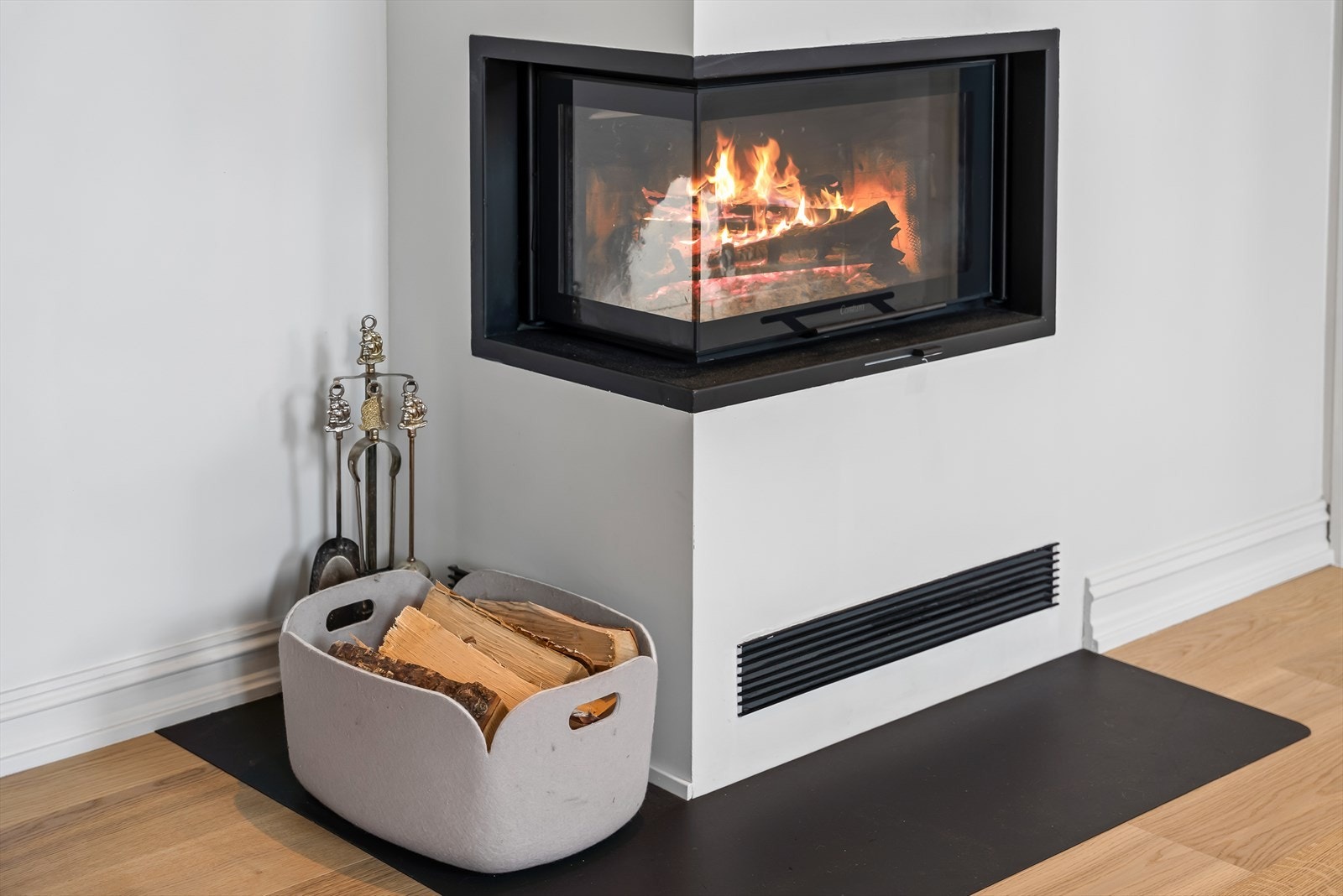 Flott ny Contura peisinnsats i stuen Galleribilde