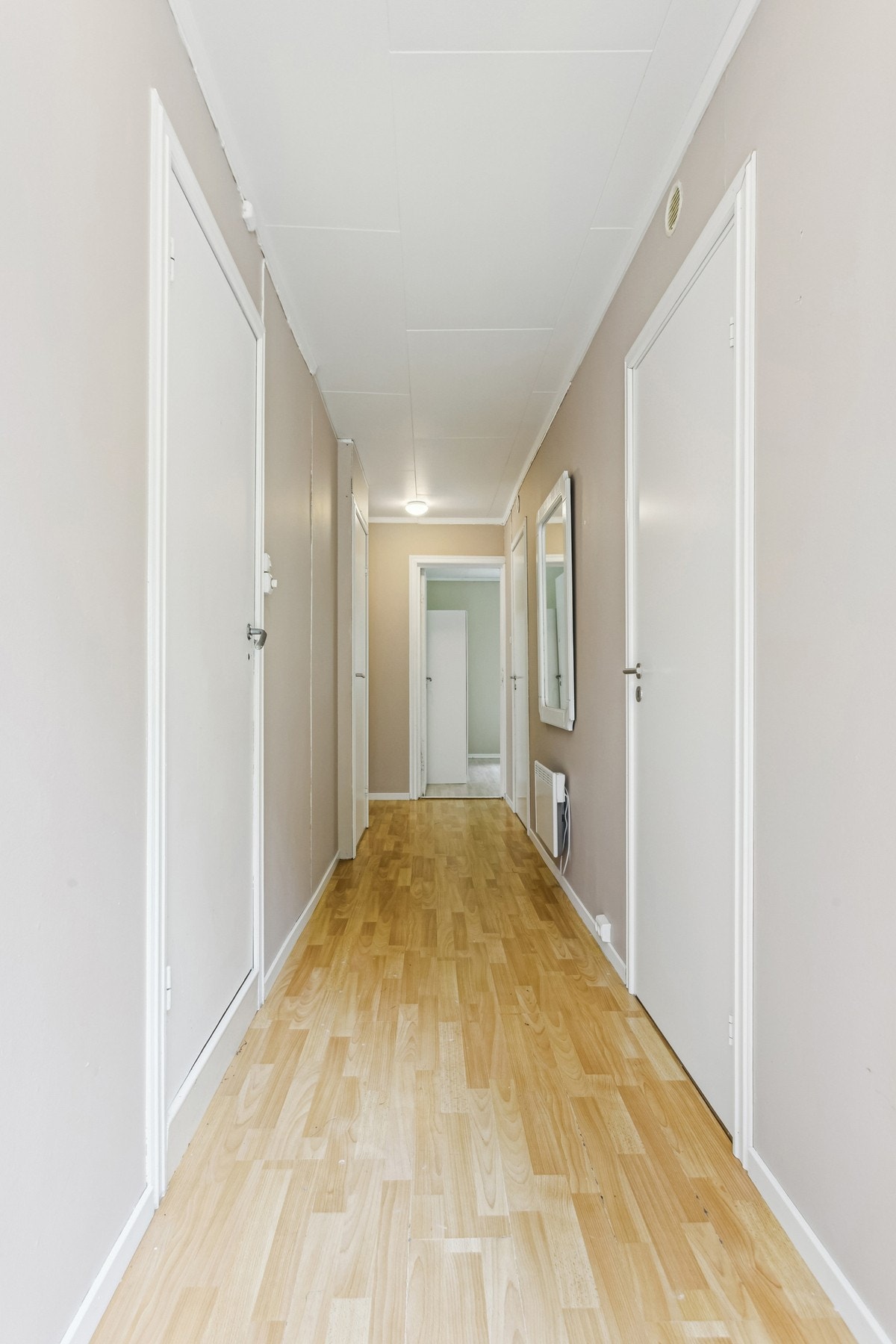 Her møter du en lys entré Galleribilde