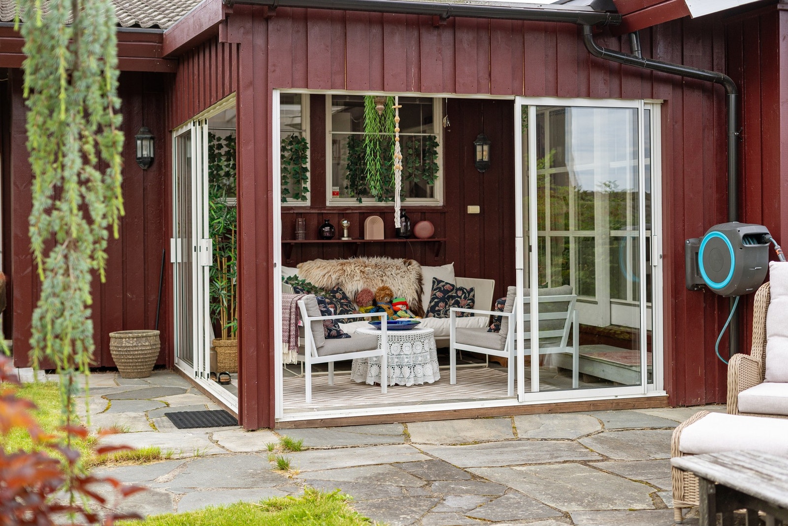 Innglasset terrasse - det er to av disse tilhørende huset Galleribilde