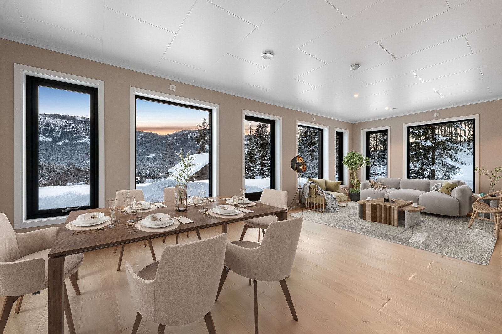 Stue og kjøkken danner et innbydende allrom på 35 kvm. Galleribilde