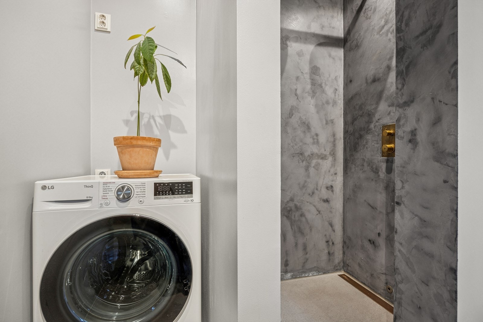 Det er opplegg for vaskemaskin. Galleribilde