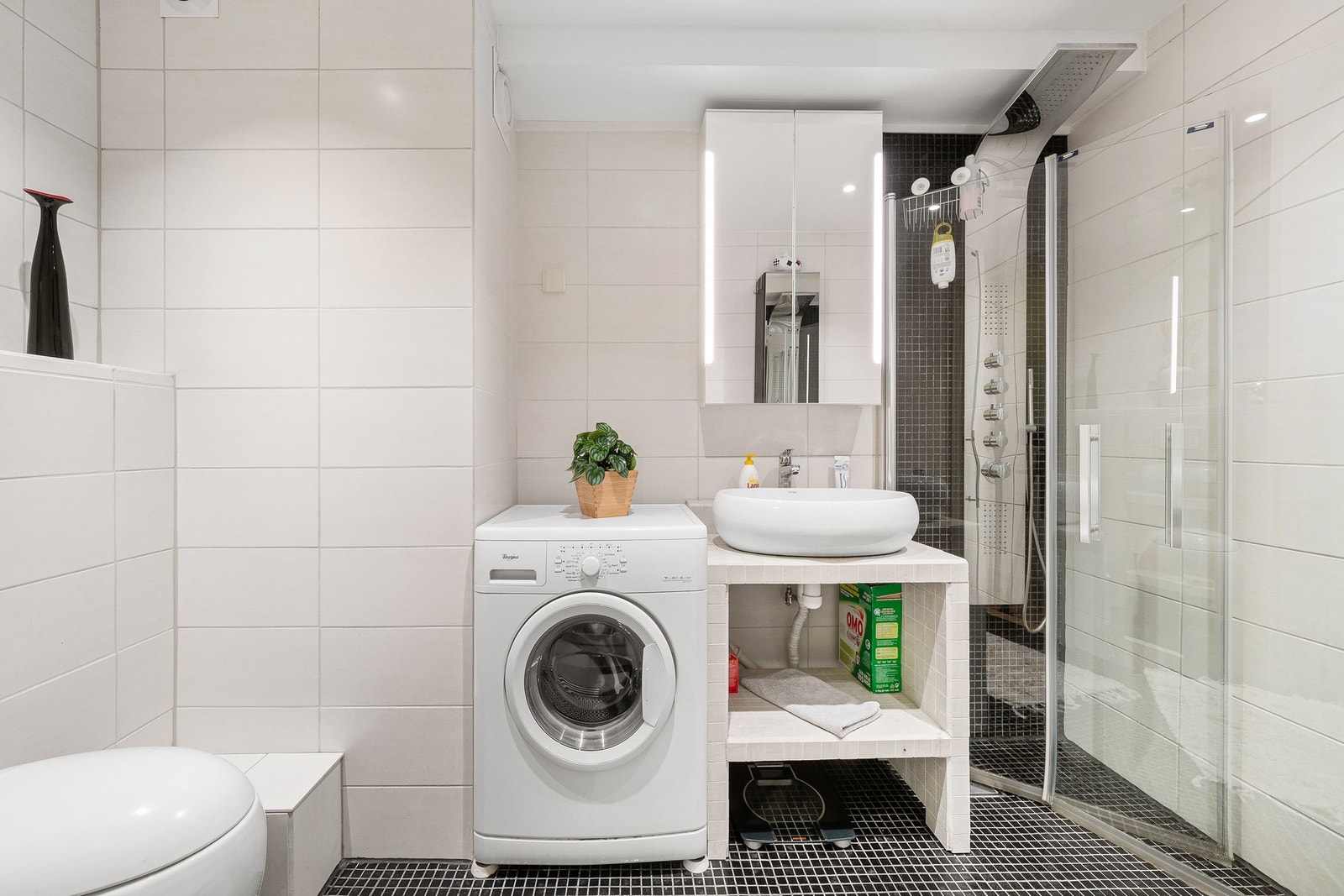 Badet har opplegg for vaskemaskin. Galleribilde