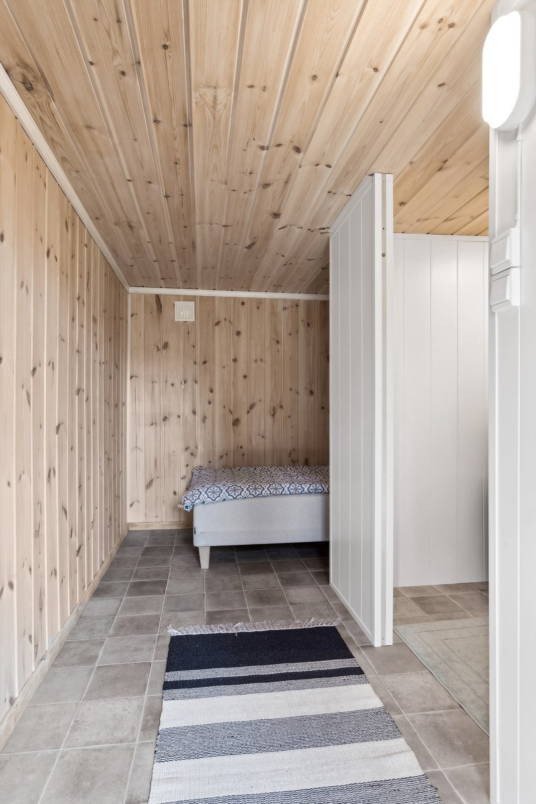 Mulighet for en liten sovealkove i stabburet. Galleribilde