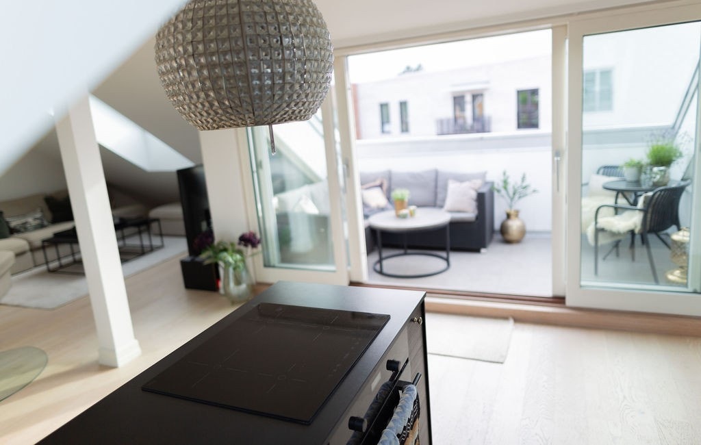 Også denne stuen ligger i åpen løsning mot kjøkken. Galleribilde