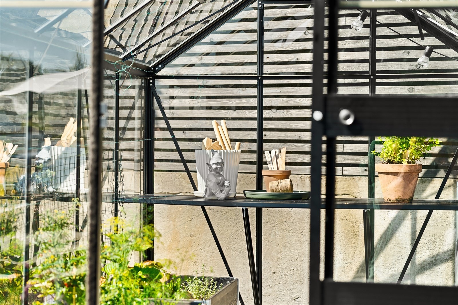 Drivhuset er fra 2022 og designet av Frodig Hagedesign Galleribilde