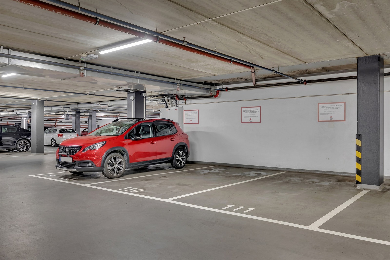 Sameiet har 3 gjesteparkeringsplasser i garasjeanlegget. Galleribilde