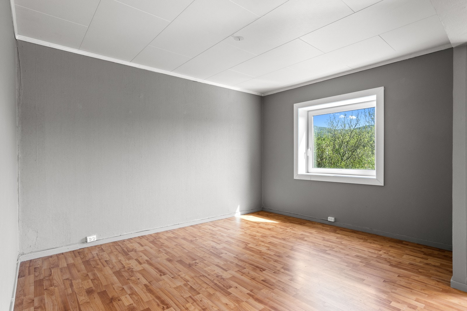 Rom ved siden av stue som opprinnelig er tegnet inn som soverom, men brukes i dag som stue. Galleribilde