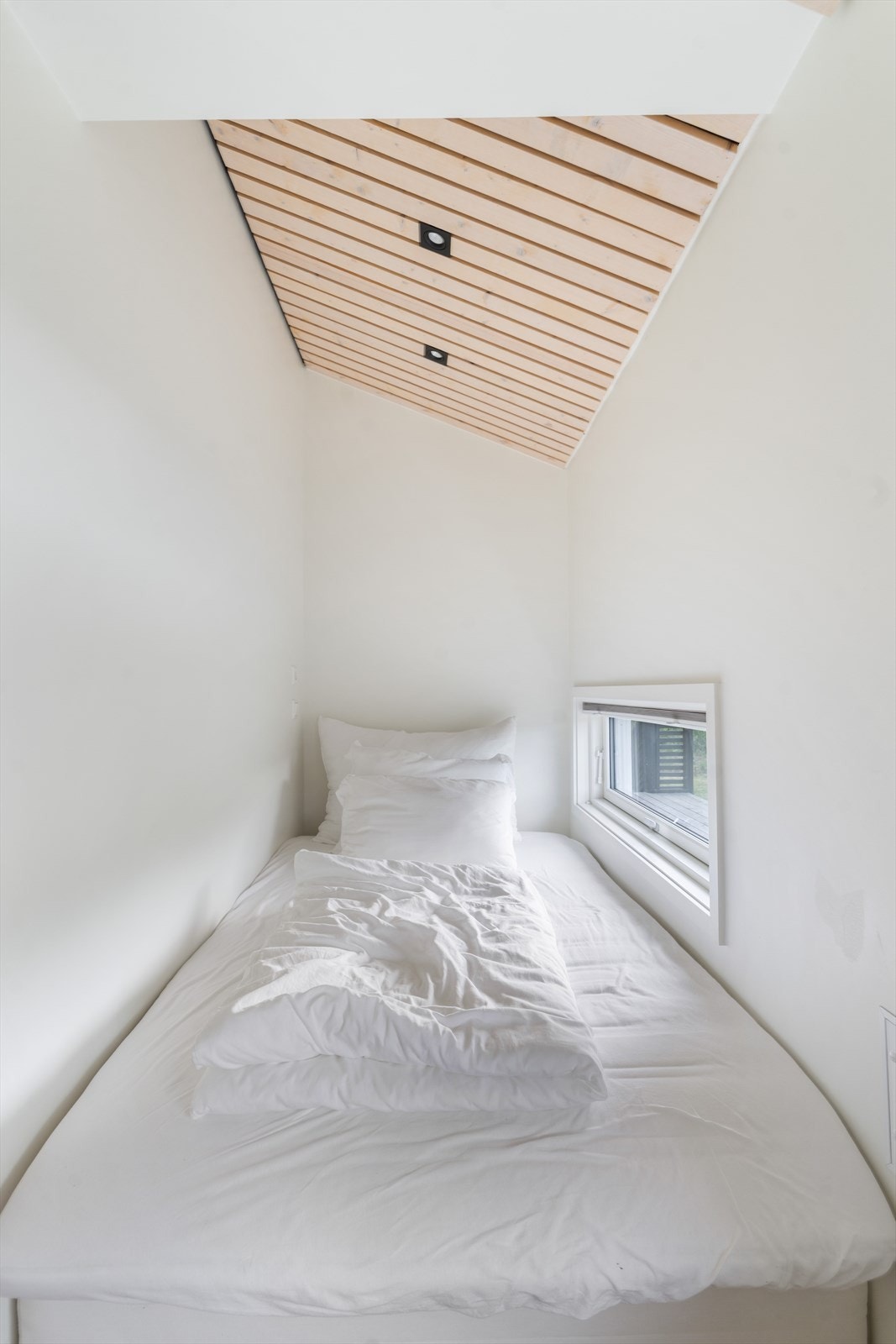 Et soverom som kombinerer funksjonalitet og trivsel på beste måte! Galleribilde