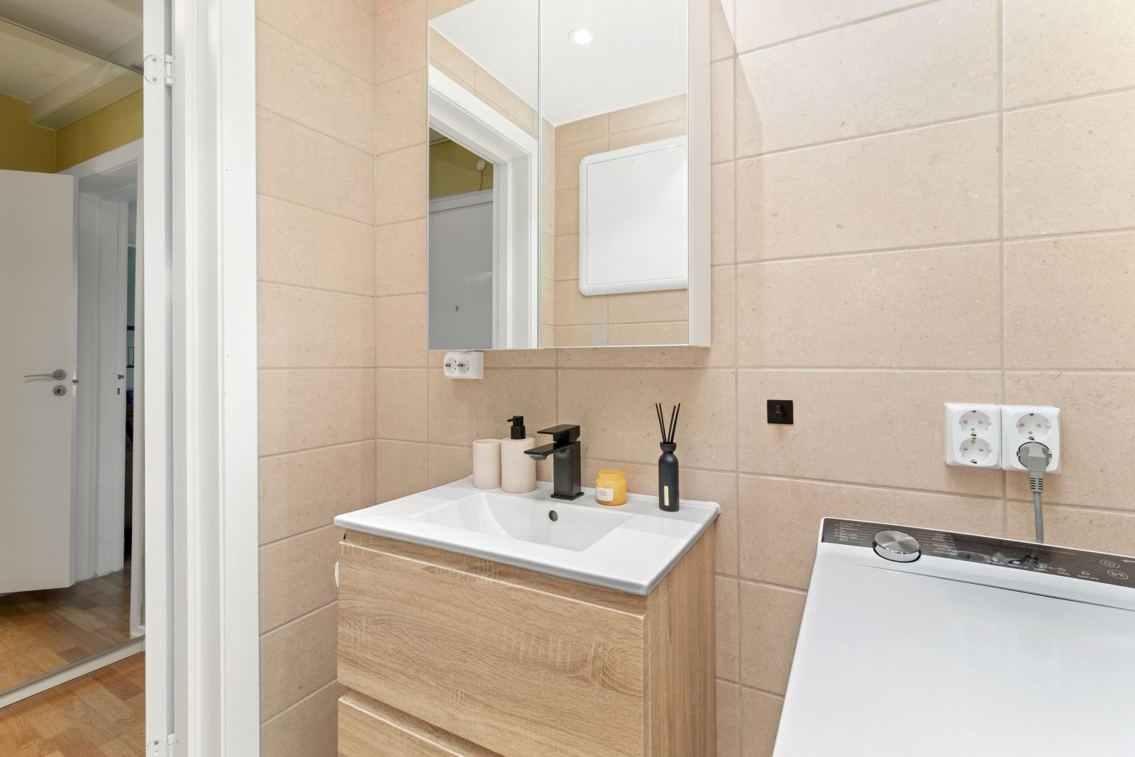 Toppmatet vaskemaskin medfølger kjøpet. Galleribilde