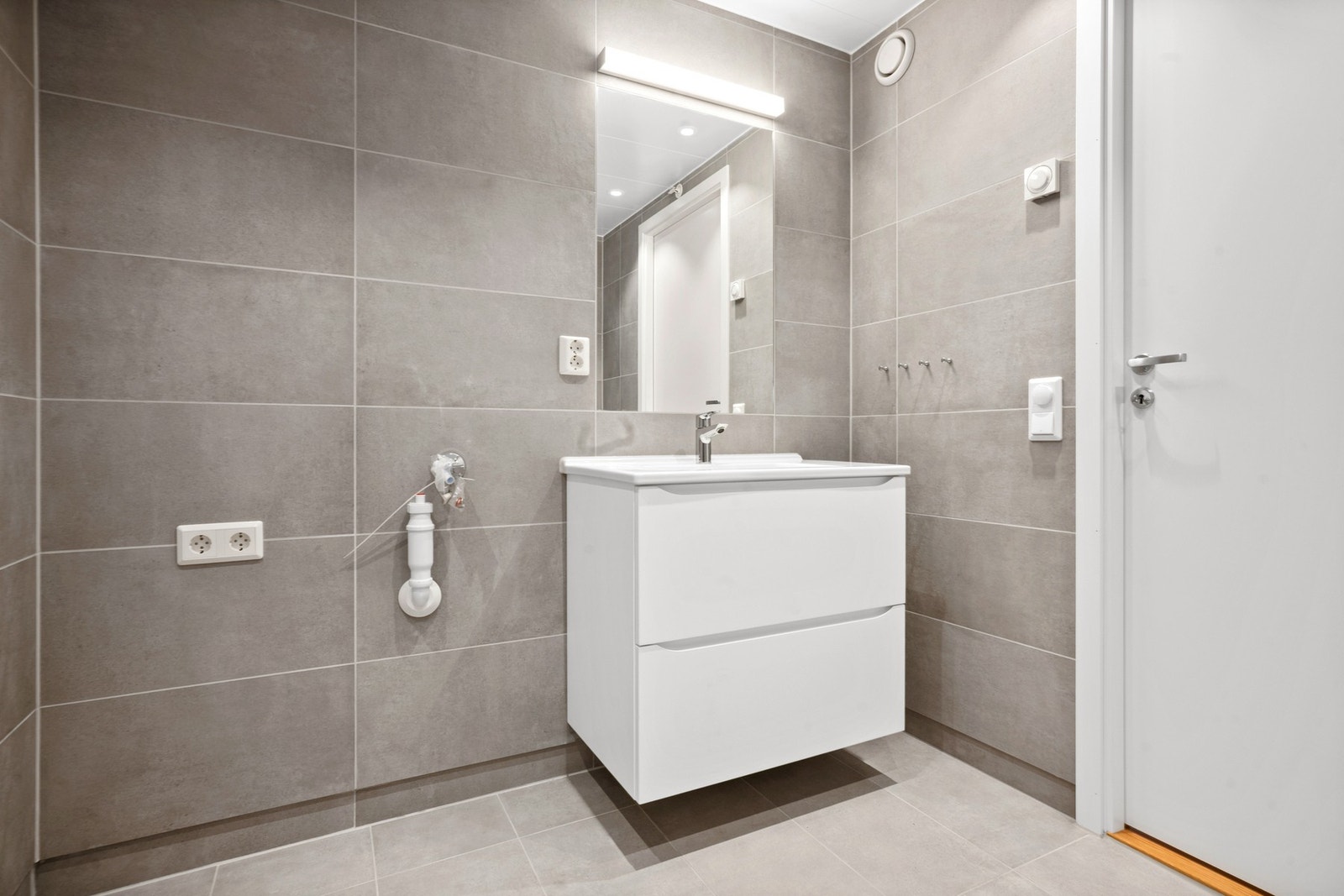 Det er god plass til vaskemaskin og evt. tørketrommel. Galleribilde