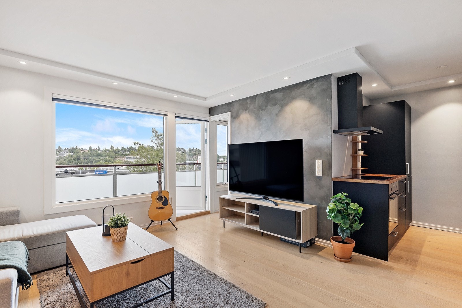 Stue og kjøkken i åpen løsning Galleribilde