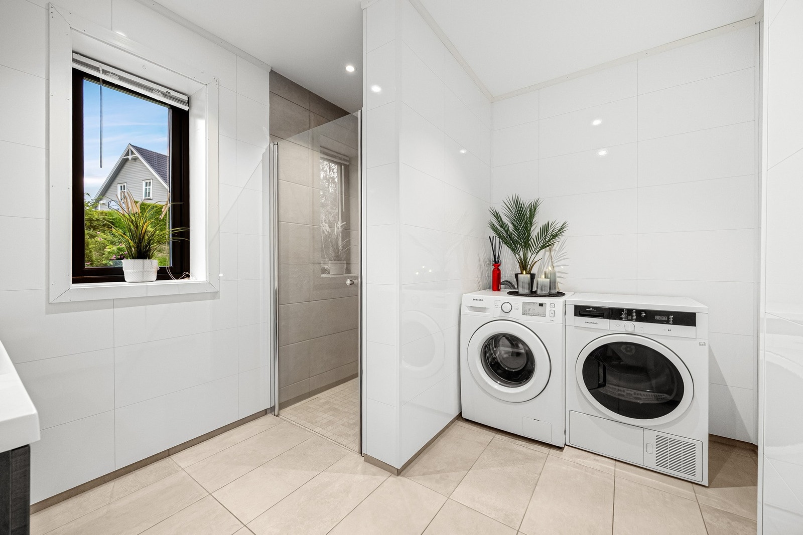 Badet har opplegg for vaskemaskin. Galleribilde